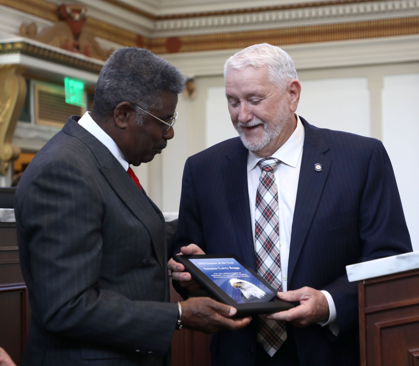 Sen. Larry Boggs, R-Wilburton (right) was presented with the Senator of the Year Award by the Oklahoma Veterans Council on Wednesday, March 27 at the State Capitol. Giving the award is Mr. Pete Peterson, President of the Oklahoma Veterans Council.