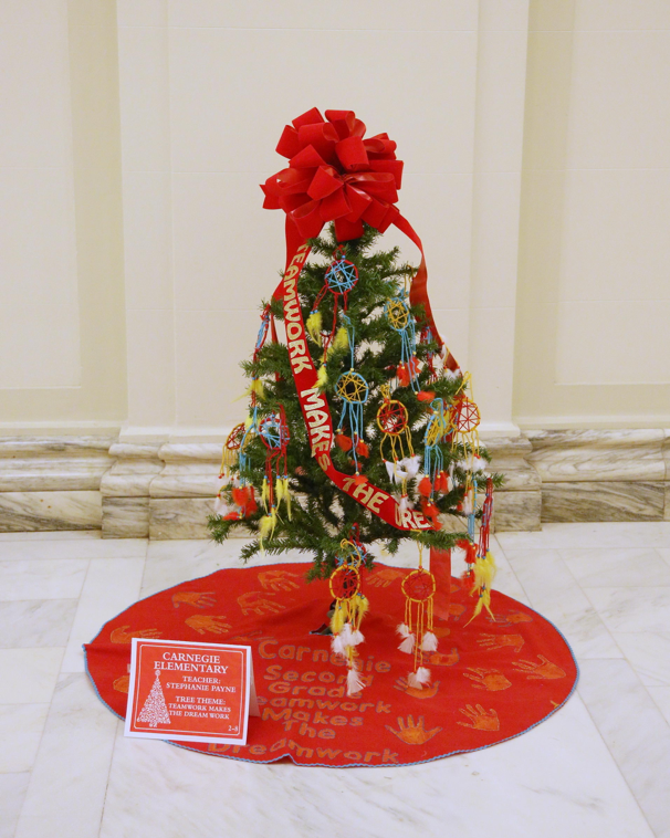 The Christmas tree decorated by Carnegie Elementary students in Stephanie Payne’s second grade class features the theme, “Teamwork makes the dream work.” The Carnegie Elementary class joined almost 700 students from across the state to decorate 26 Christmas trees throughout the State Capitol building on November 30.