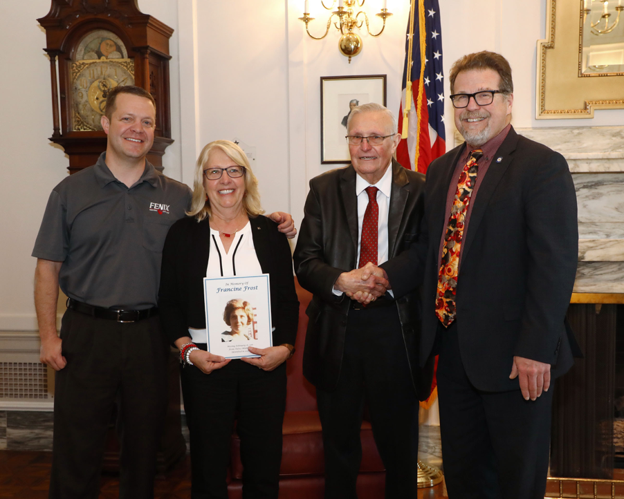Francine Frost’s grandson, Cory Curl (left), daughter Vicki Frost Curl, and husband Malcolm Frost, visit with Sen. Bergstrom (right) on Monday after Francine’s Law passed unanimously in the Senate.