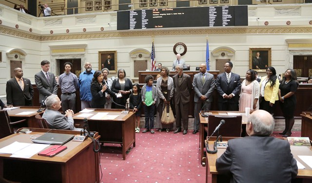Sen. Anastasia introduces former Sen. Melvin Porter and his family.  Also pictured on far left is Sen. Kevin Matthews and Sen. David Holt.